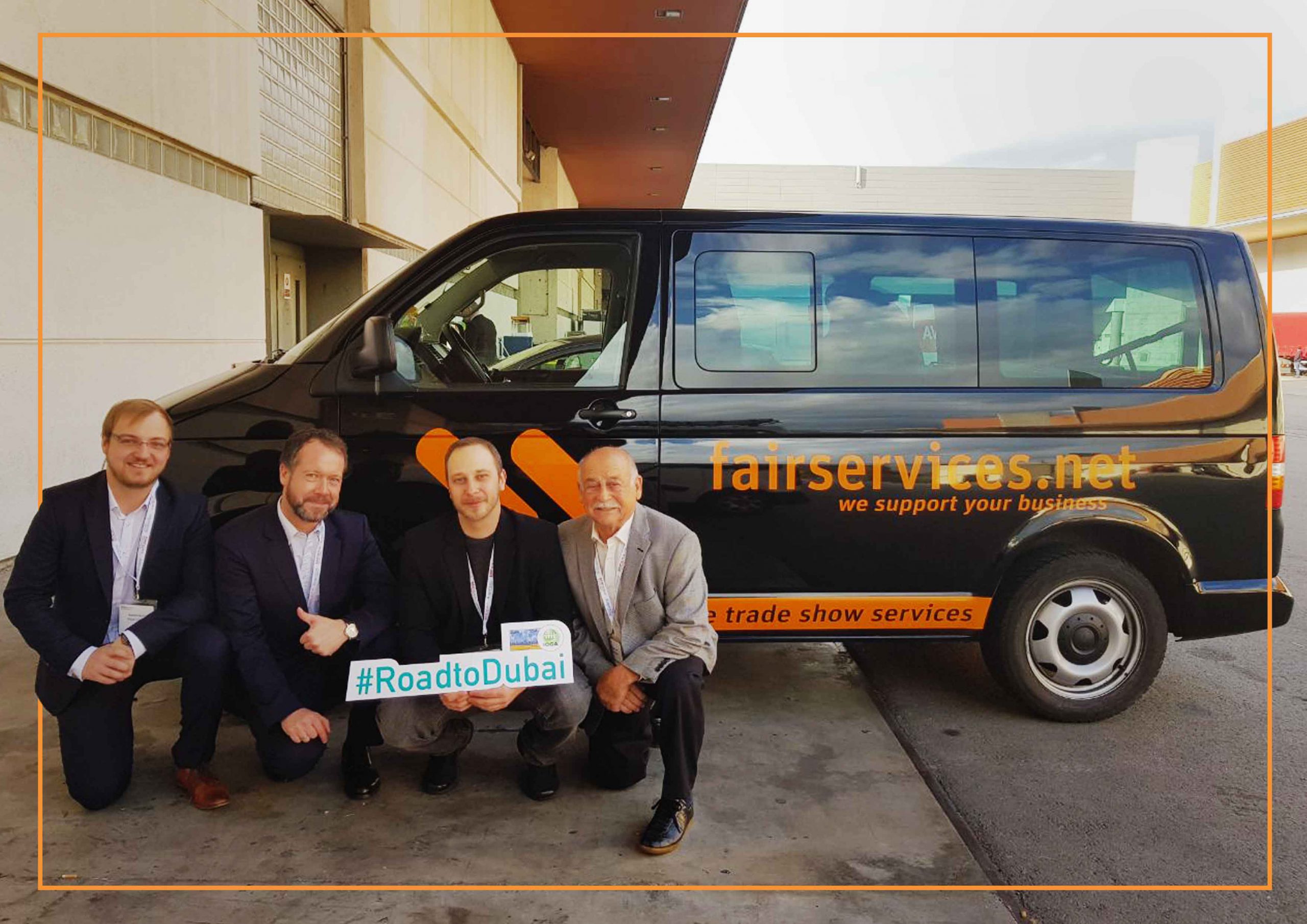 fairservices team in front of their branded car